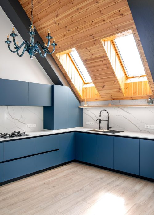 attic-kitchen-wooden-ceiling-modern-blue-fronts_169016-68929
